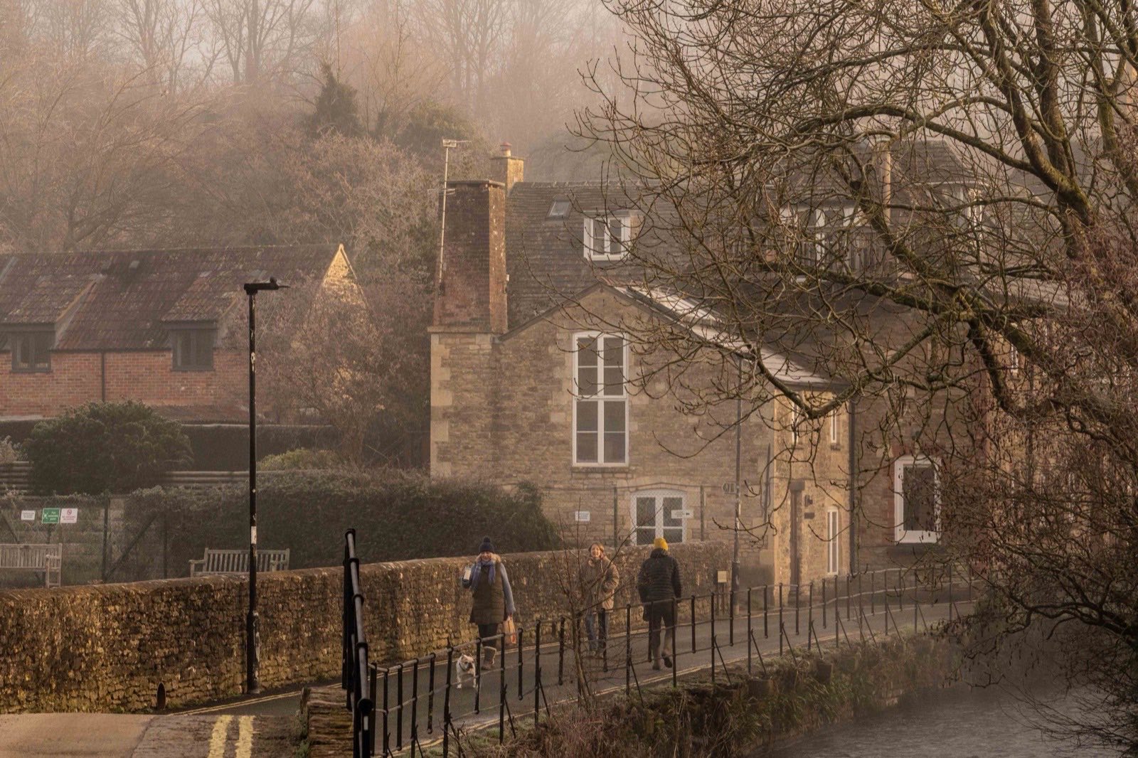 A UK street at first light on a misty morning