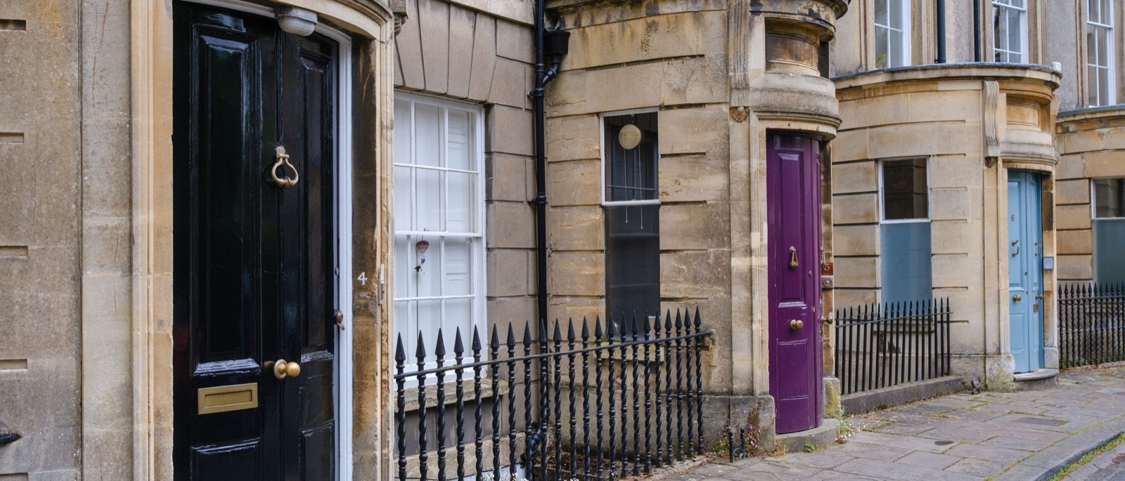A row of front doors on a UK street